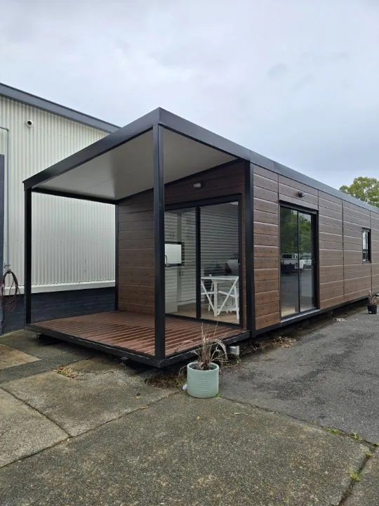 Roomi Ranch at the factory, with its integrated end veranda.